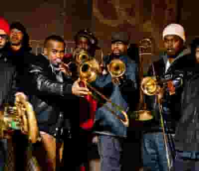 Hypnotic Brass Ensemble blurred poster image