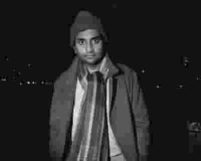 Aziz Ansari tickets blurred poster image