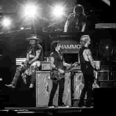 Guns N' Roses blurred poster image