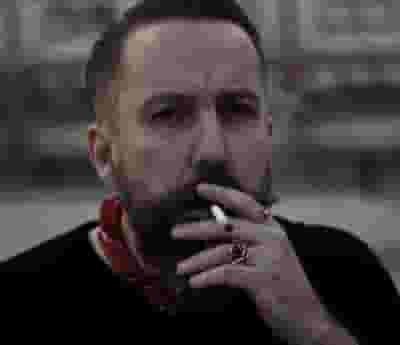 Andrew Weatherall blurred poster image