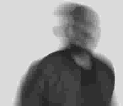 George Mensah blurred poster image