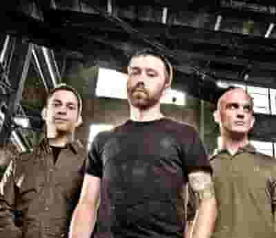 Rise Against blurred poster image