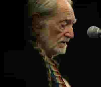 Willie Nelson blurred poster image