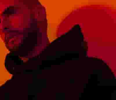 AJ Christou blurred poster image