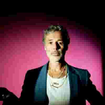 Baxter Dury blurred poster image