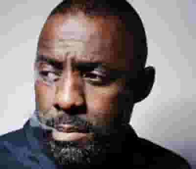 Idris Elba blurred poster image