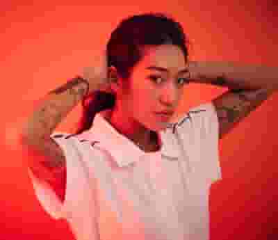 Peggy Gou blurred poster image