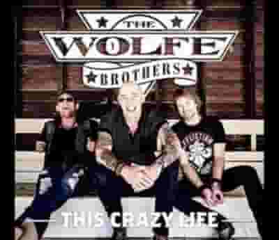 The Wolfe Brothers blurred poster image