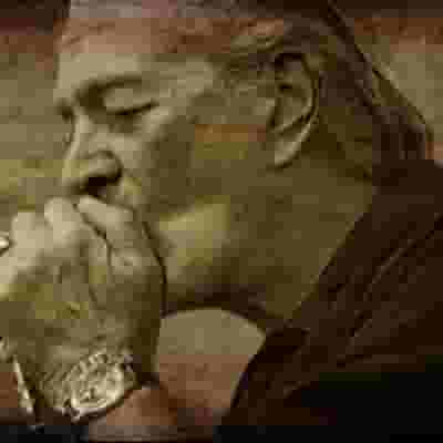 Charlie Musselwhite blurred poster image