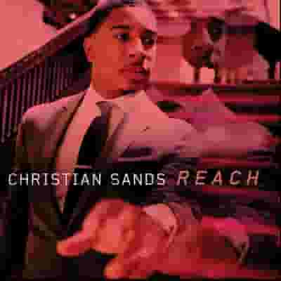 Christian Sands blurred poster image