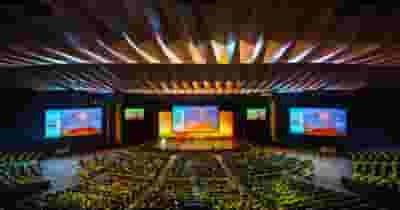 Plenary Theatre In Mcec blurred poster image