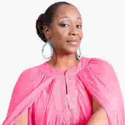 Regina Belle blurred poster image