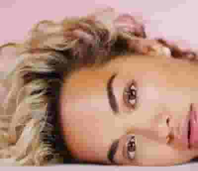 Rita Ora blurred poster image