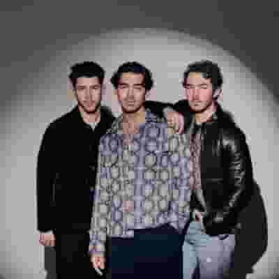 Jonas Brothers blurred poster image