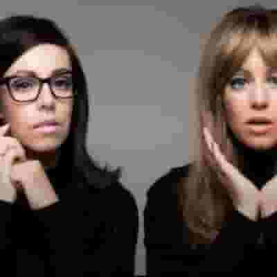 Flo & Joan - Now Playing blurred poster image