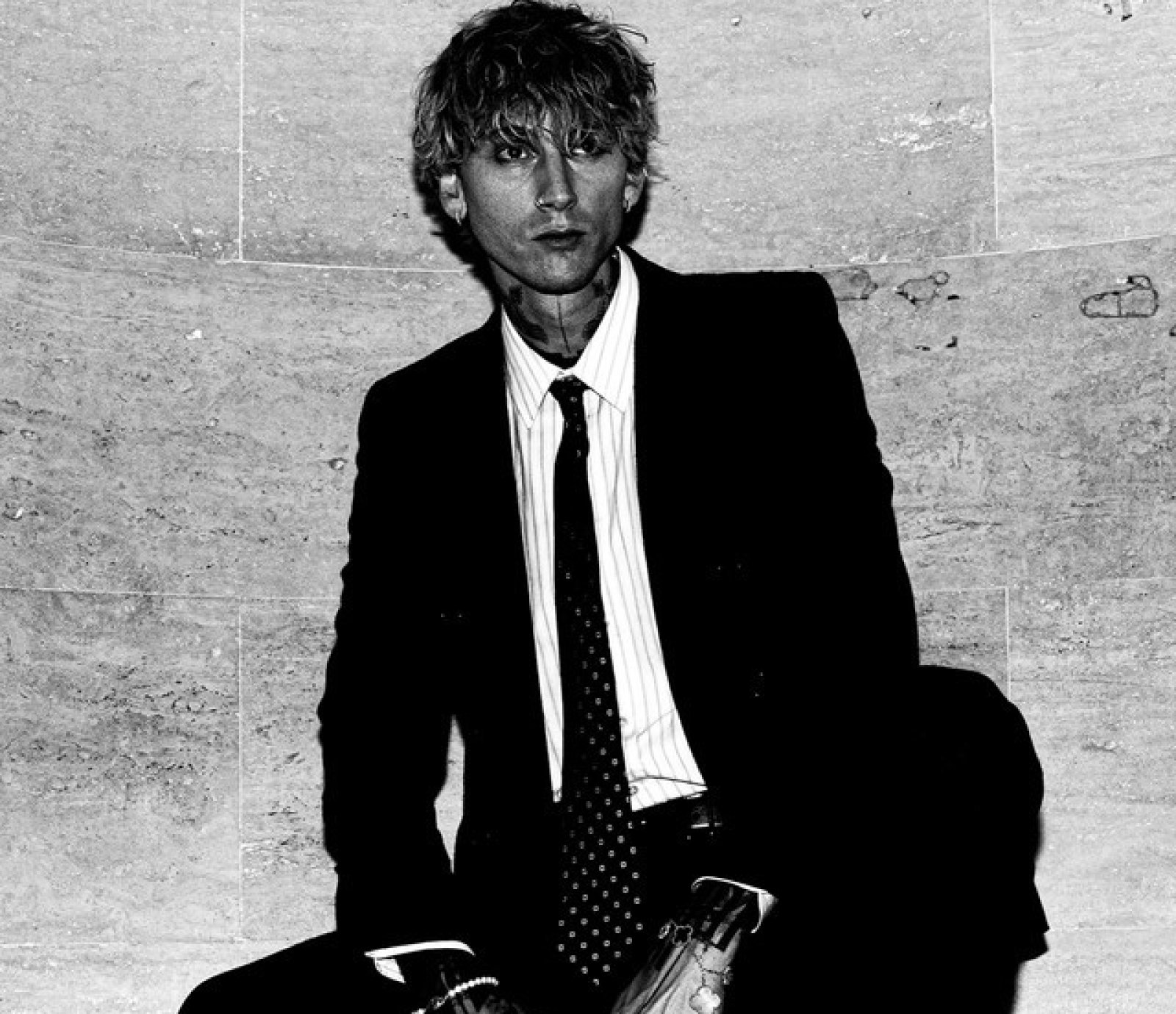 Machine Gun Kelly's Blackout Tattoo Leads to Severe Health Complications